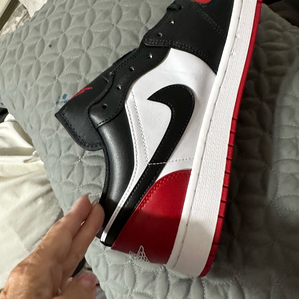 Jordan Air 1 Low in White, Black, and Red - Picture 9 of 14
